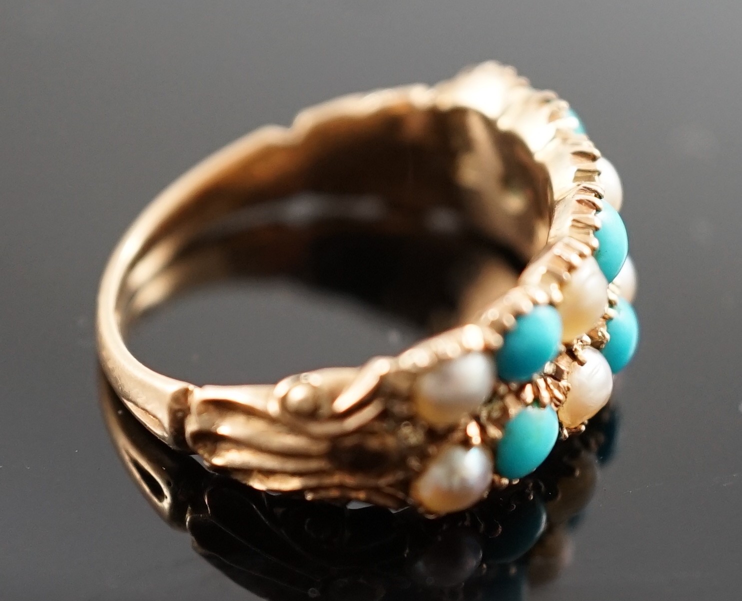 A Victorian gold two row turquoise and split pearl set half hoop ring